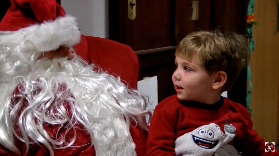 Little boy with Santa Clause