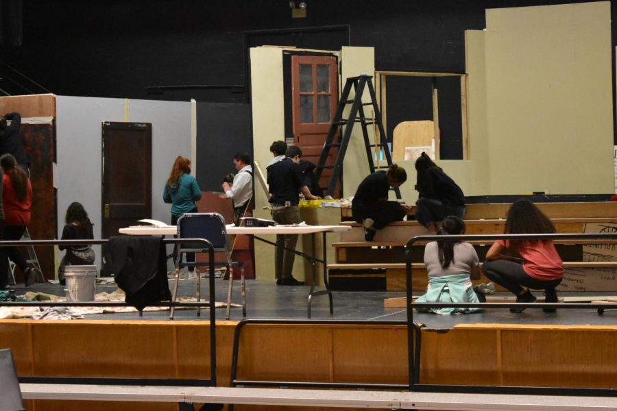 Stage Crew building up the stage for the play. 