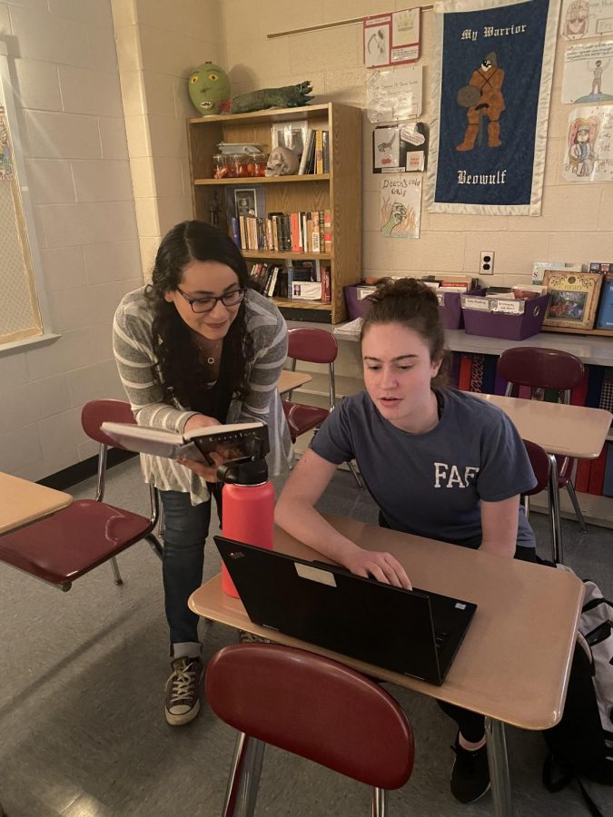 Ms. Quatraro helping a student.