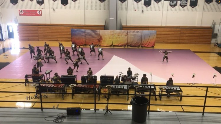 Indoor marching band performing their show “Built for Them.”