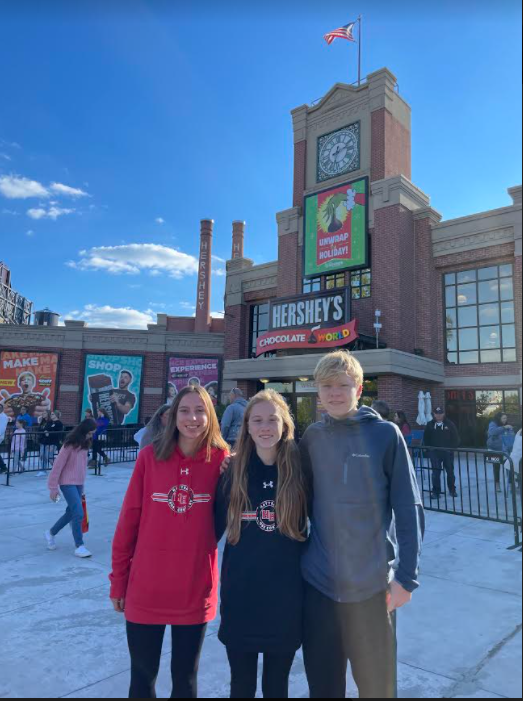 Junior Emily Simko, freshman Lily DiCola and junior Brian DiCola at states at Hershey World Chocolate Factory.