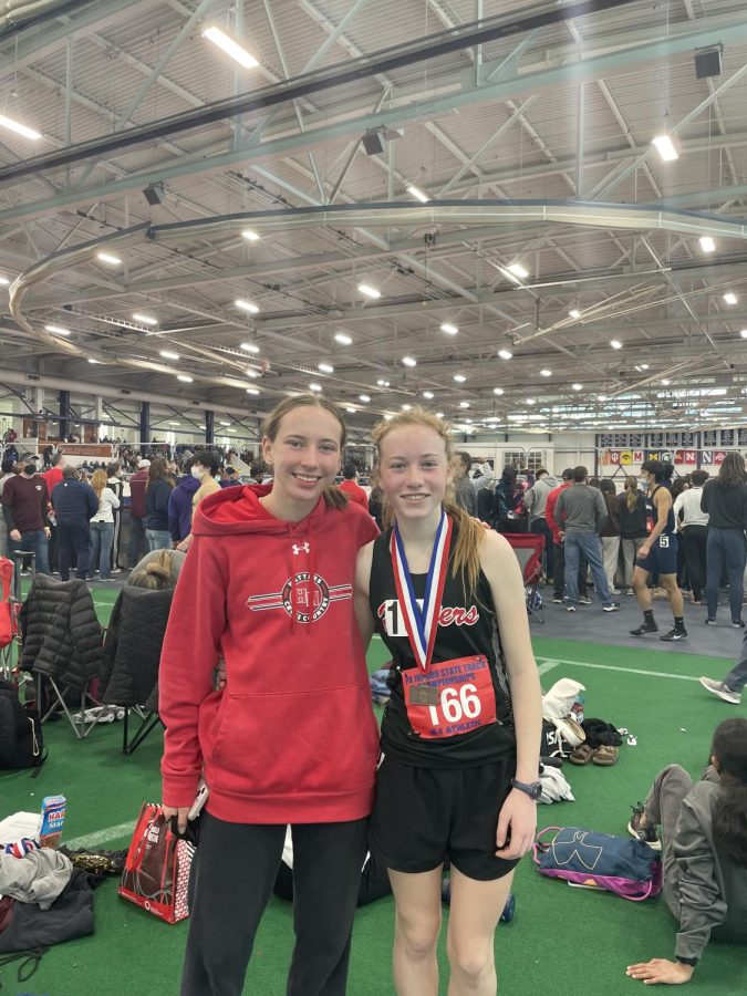 Junior Emily Simko and freshman Lily DiCola at state championships where they and junior Brian DiCola competed.