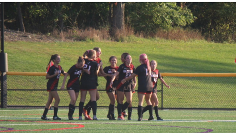 The Lady Hatters celebrating a goal against Wissahickon in a 4-2 victory.