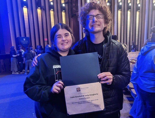 Seniors Emily Dougherty and Caleb Hansford with their award.