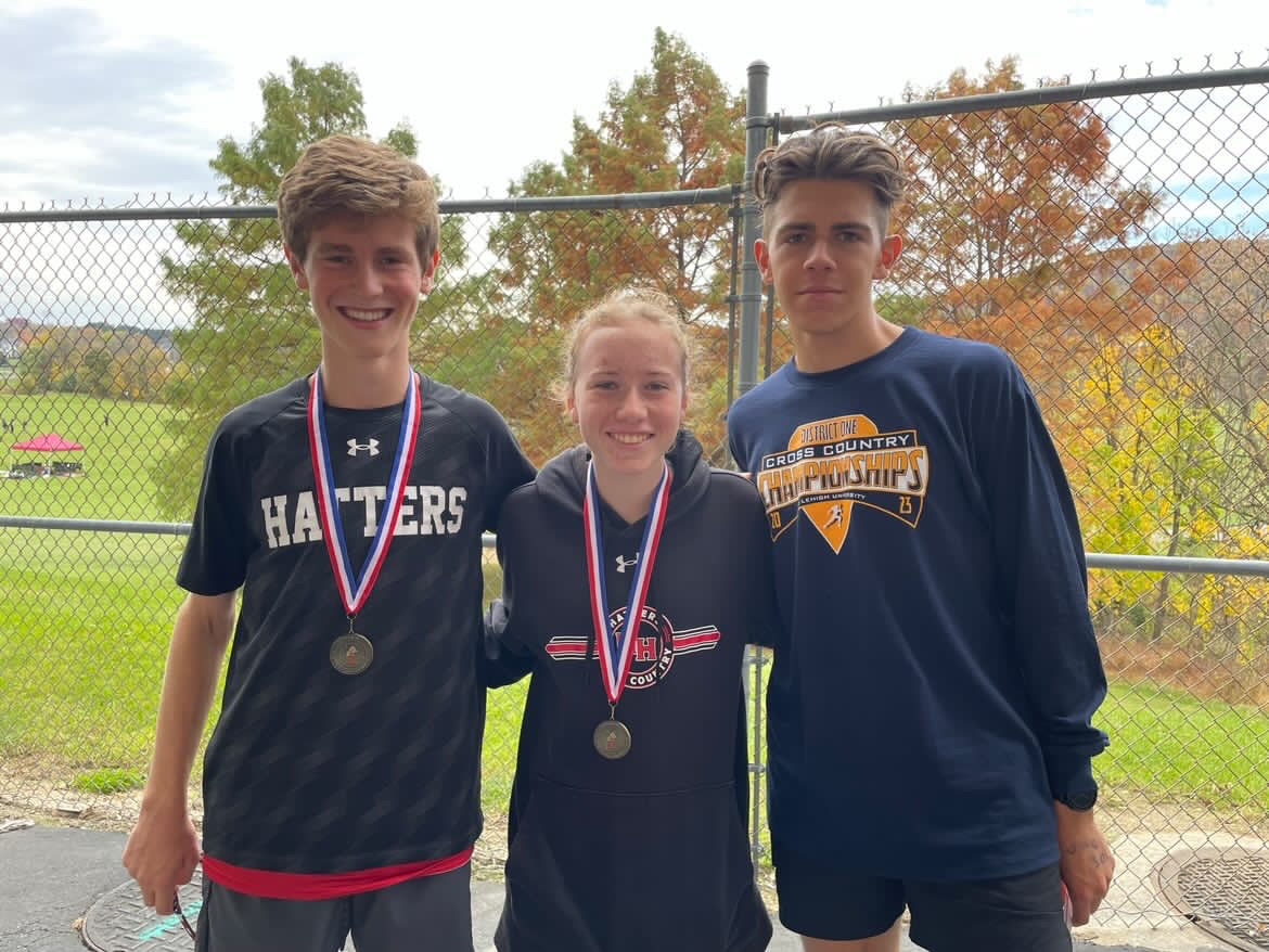 Cole Scattergood (left), Lillian DiCola (center), and Rocco Pugliese (right) at District One Championships at Lehigh University.